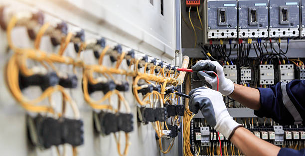 Professional Electrician technician working in Tangelo Park, FL